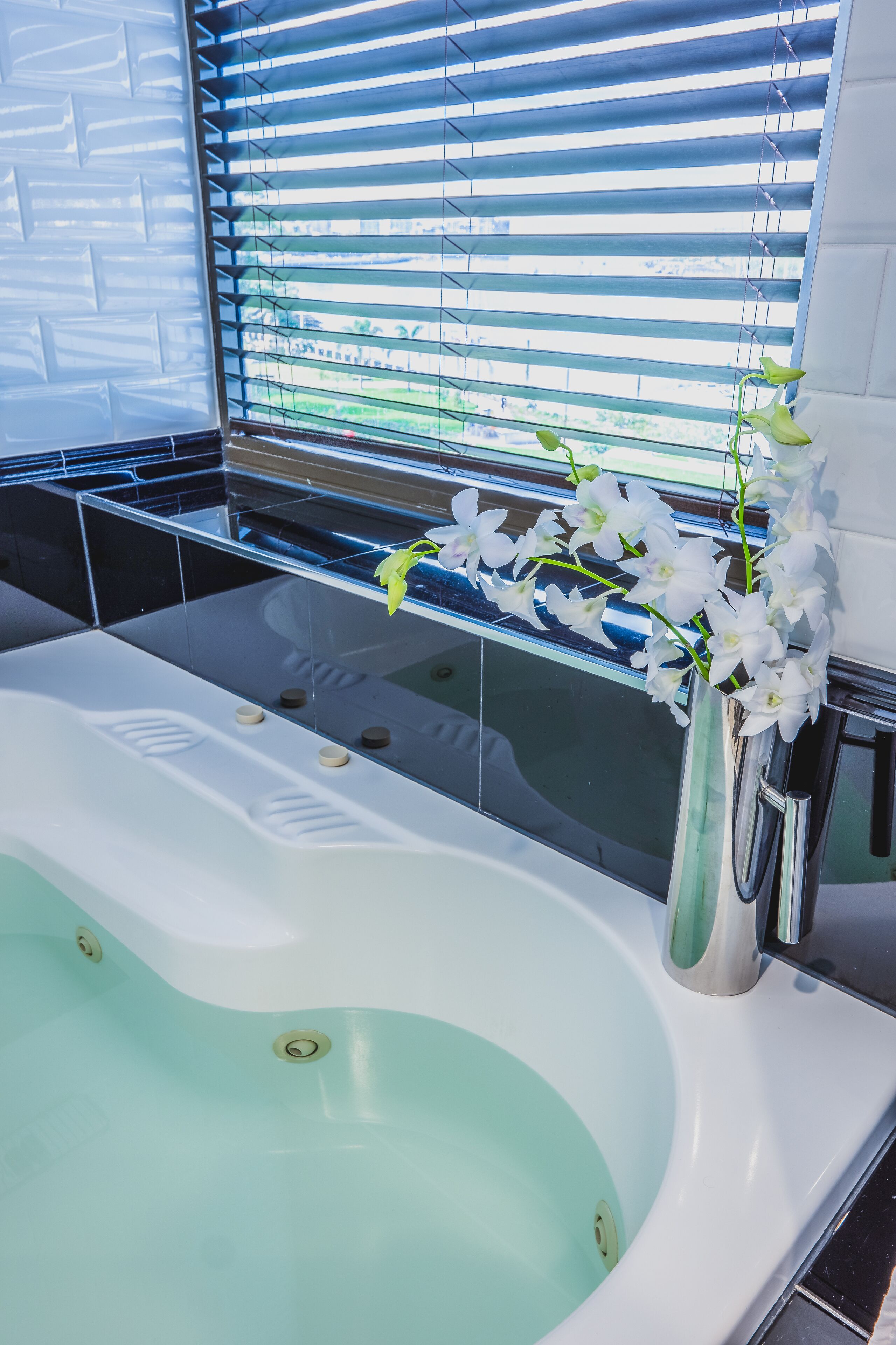 suite, jetted tub, river view | private spa tub