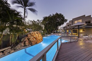 Outdoor pool, pool umbrellas, sun loungers