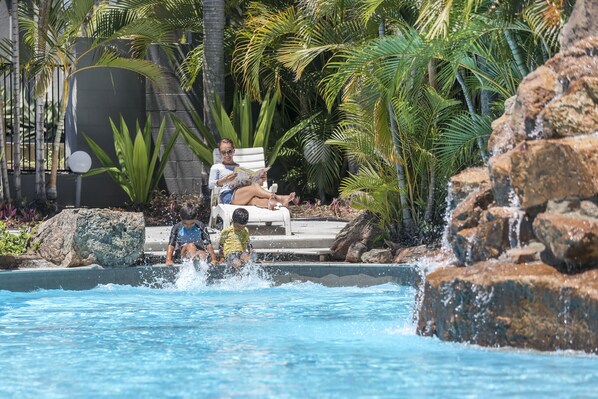 Outdoor pool, pool umbrellas, sun loungers