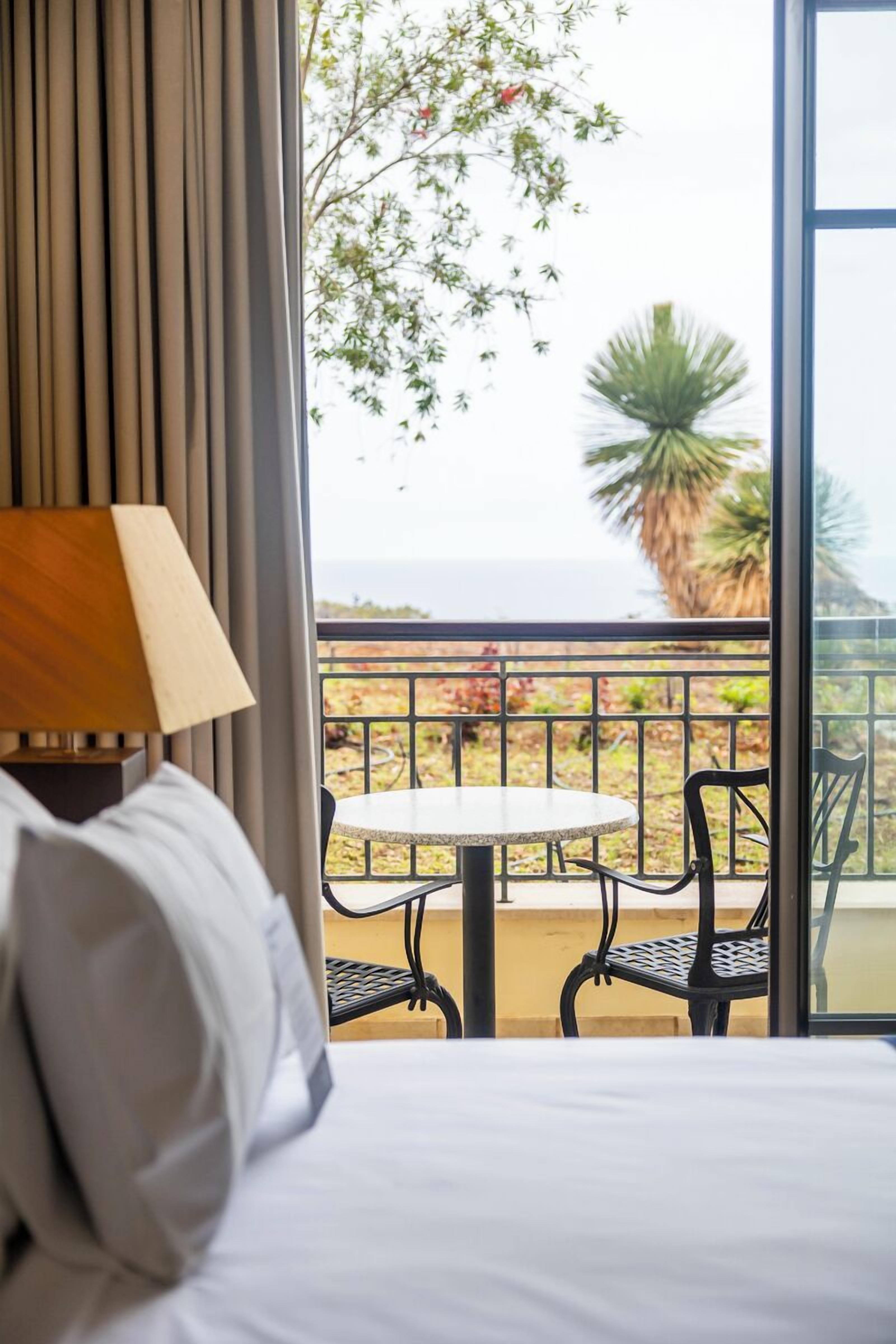 suite | minibar, in-room safe, desk, blackout curtains