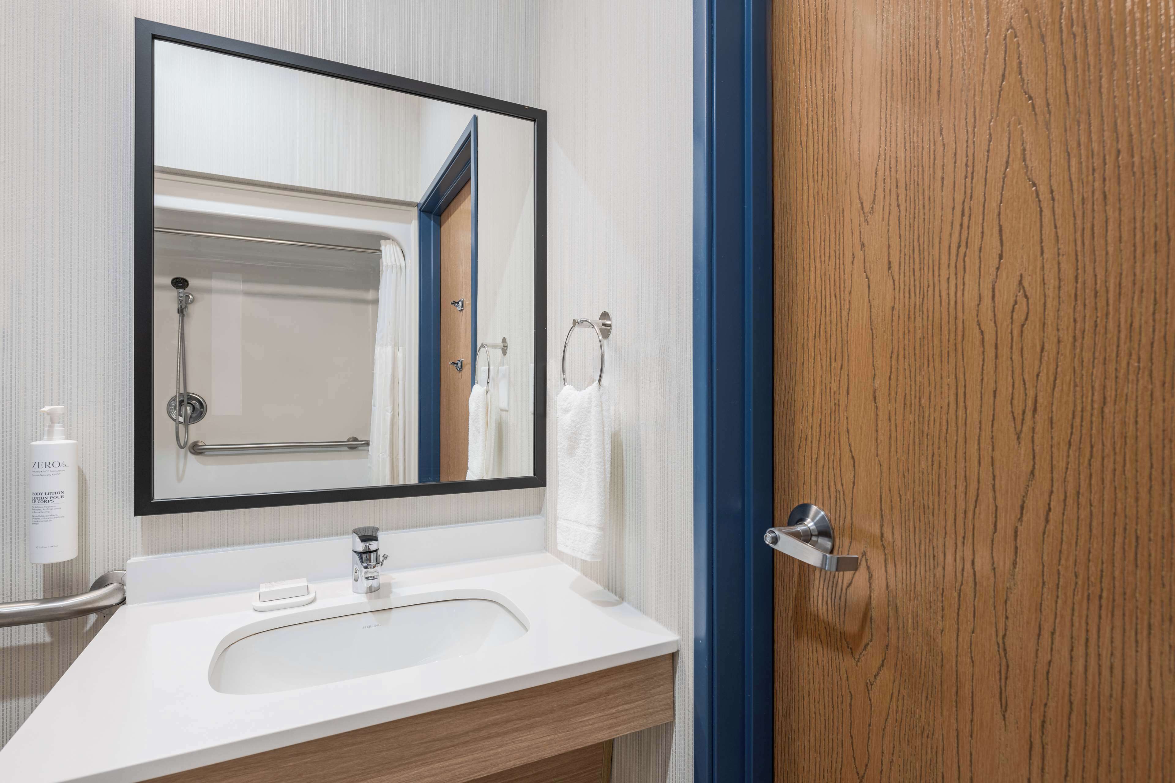 combined shower/bathtub, free toiletries, hair dryer, towels