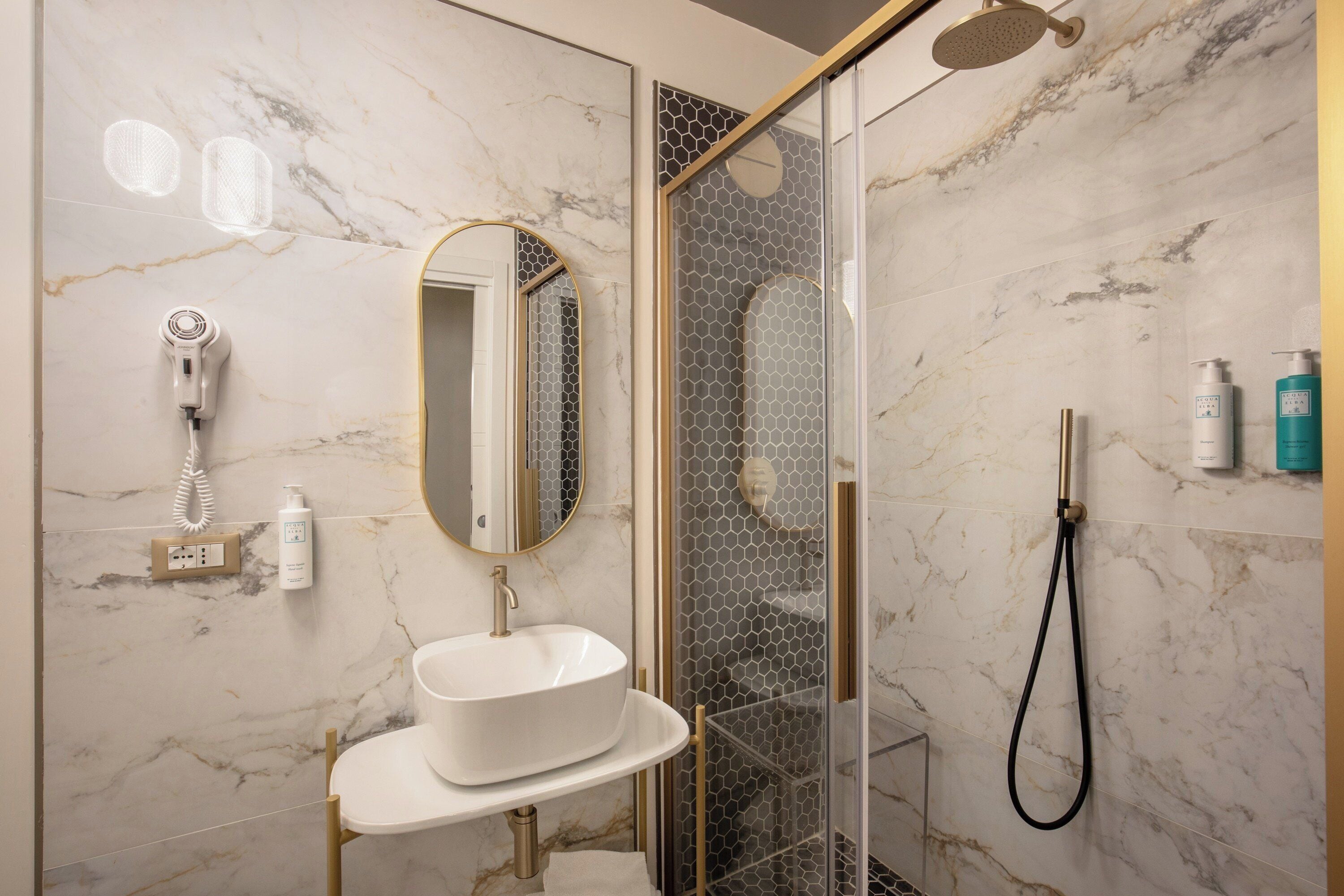 free toiletries, hair dryer, bidet, towels