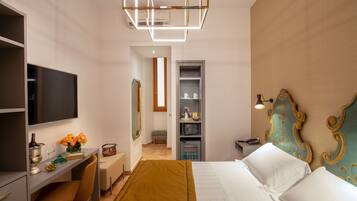 Double Room | Minibar, in-room safe, individually decorated, desk