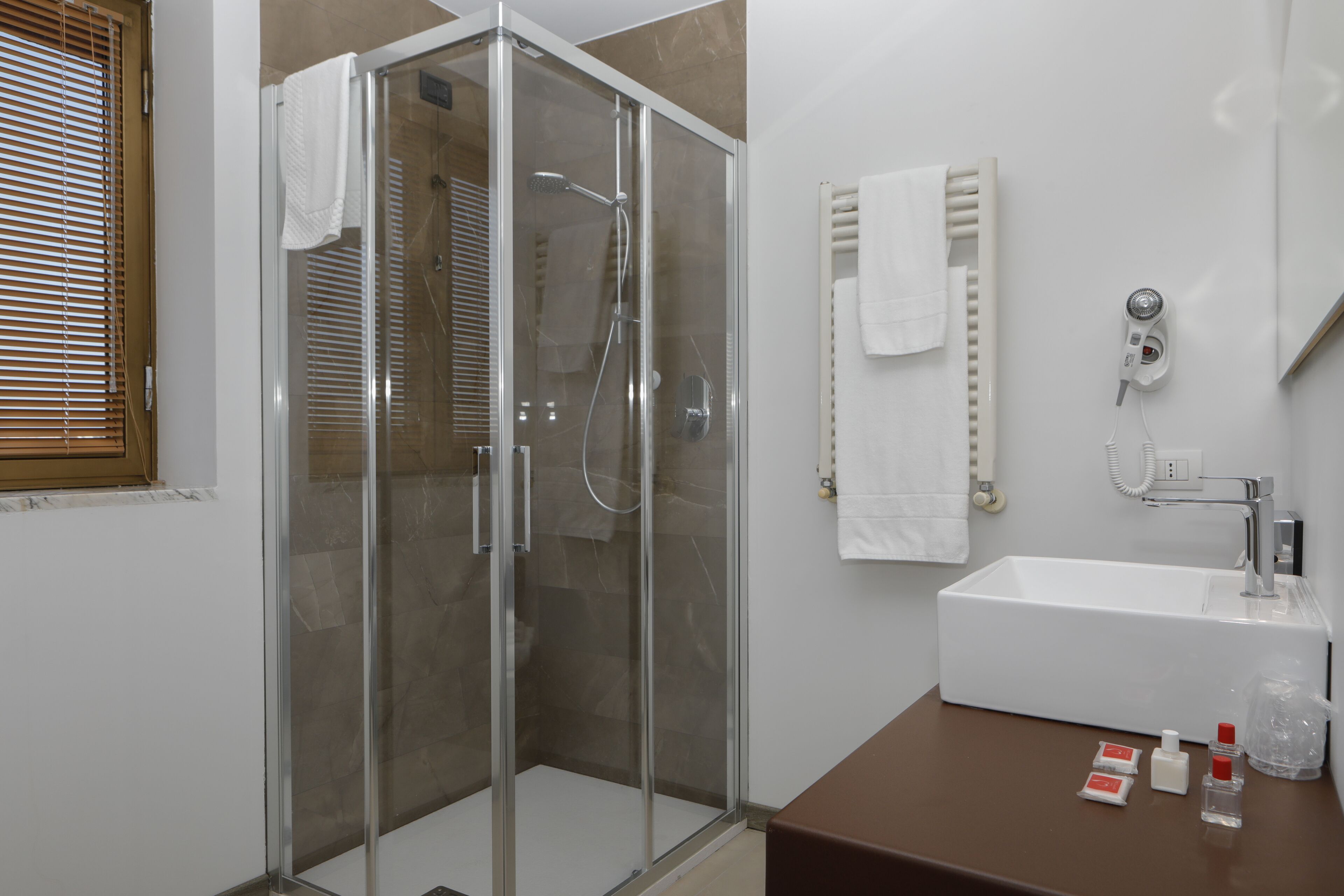 free toiletries, hair dryer, bidet, towels