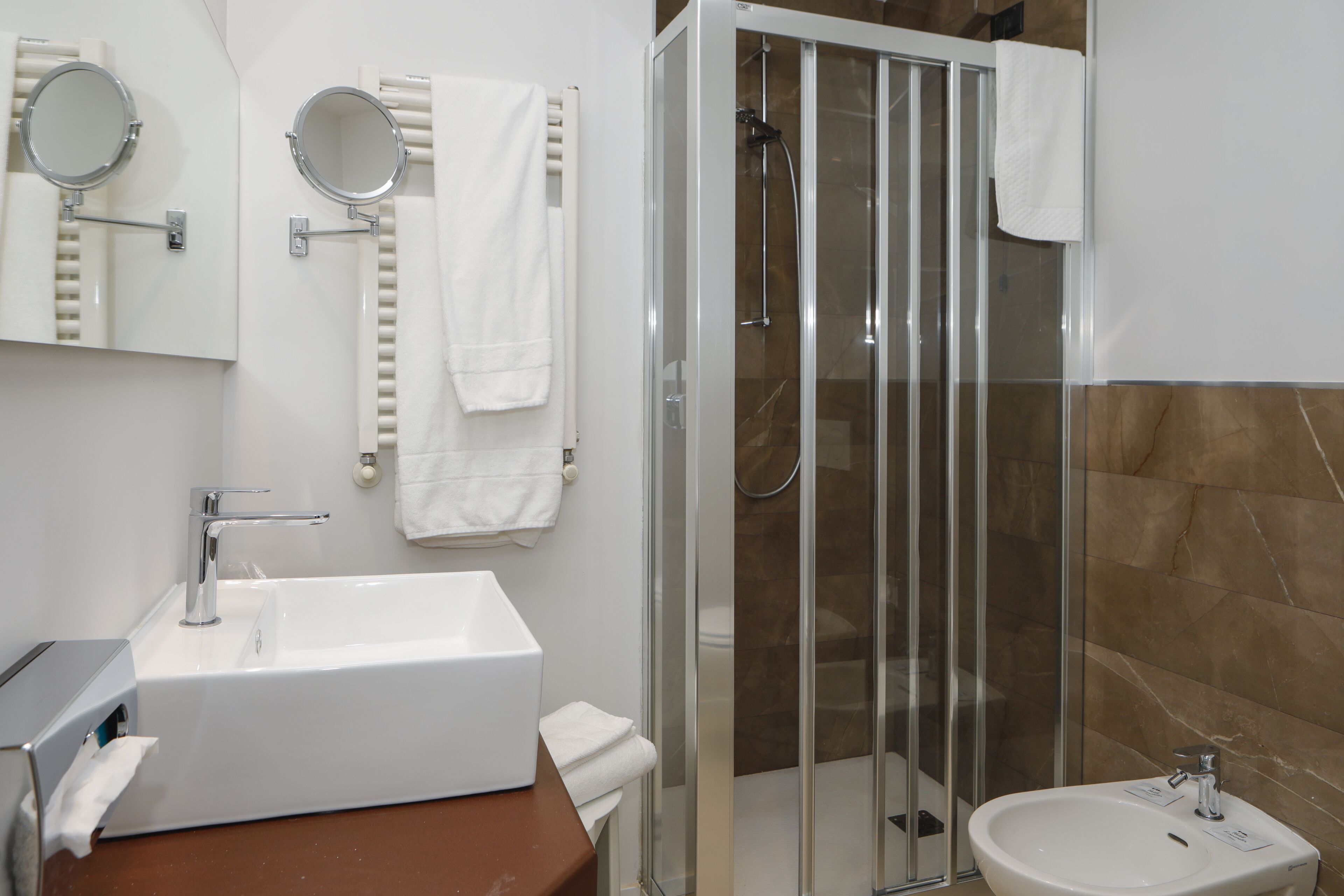 free toiletries, hair dryer, bidet, towels