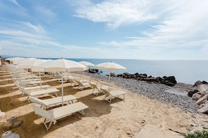 Sun-loungers, beach umbrellas