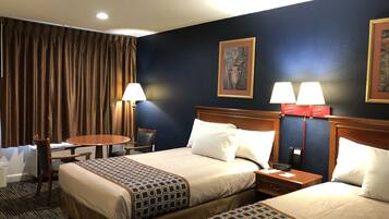 Desk, iron/ironing board, free cribs/infant beds, rollaway beds