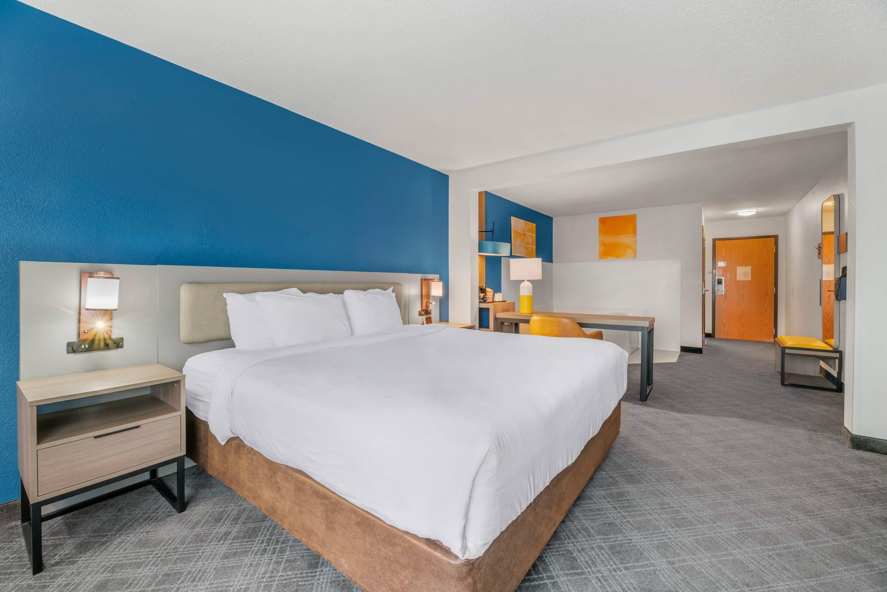 Suite, 1 King Bed, Non Smoking | In-room safe, desk, iron/ironing board, cots/infant beds