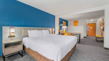 Suite, 1 King Bed, Non Smoking | In-room safe, desk, iron/ironing board, cots/infant beds