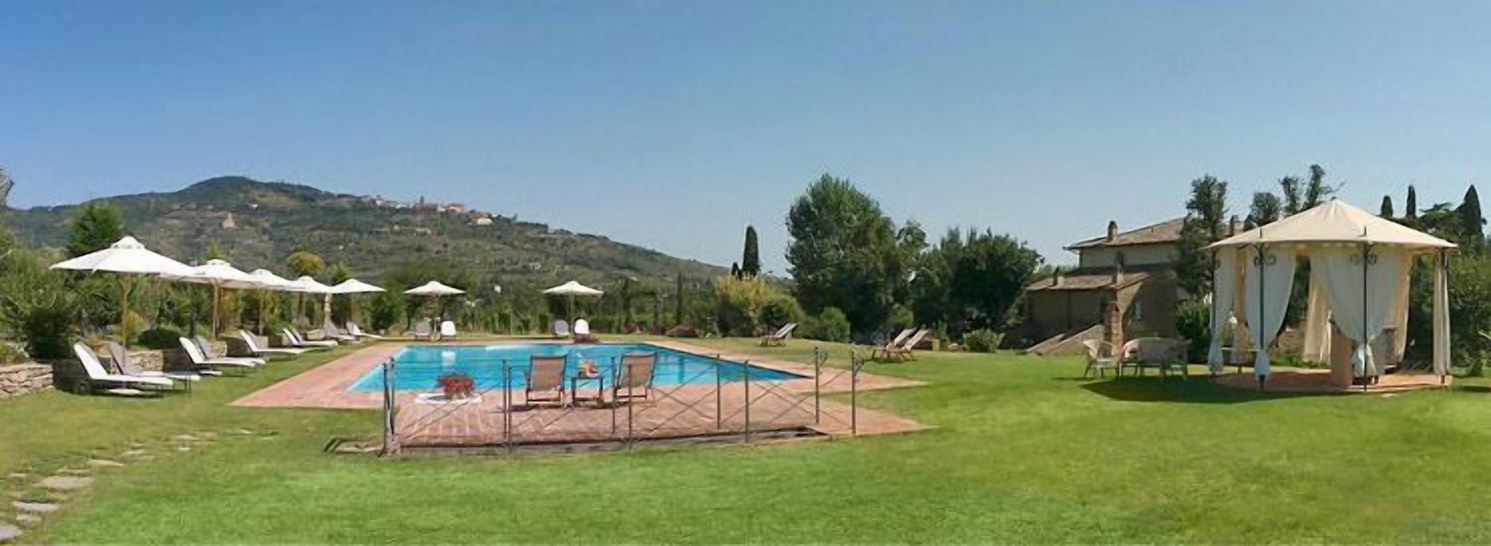 seasonal outdoor pool, pool umbrellas, pool loungers