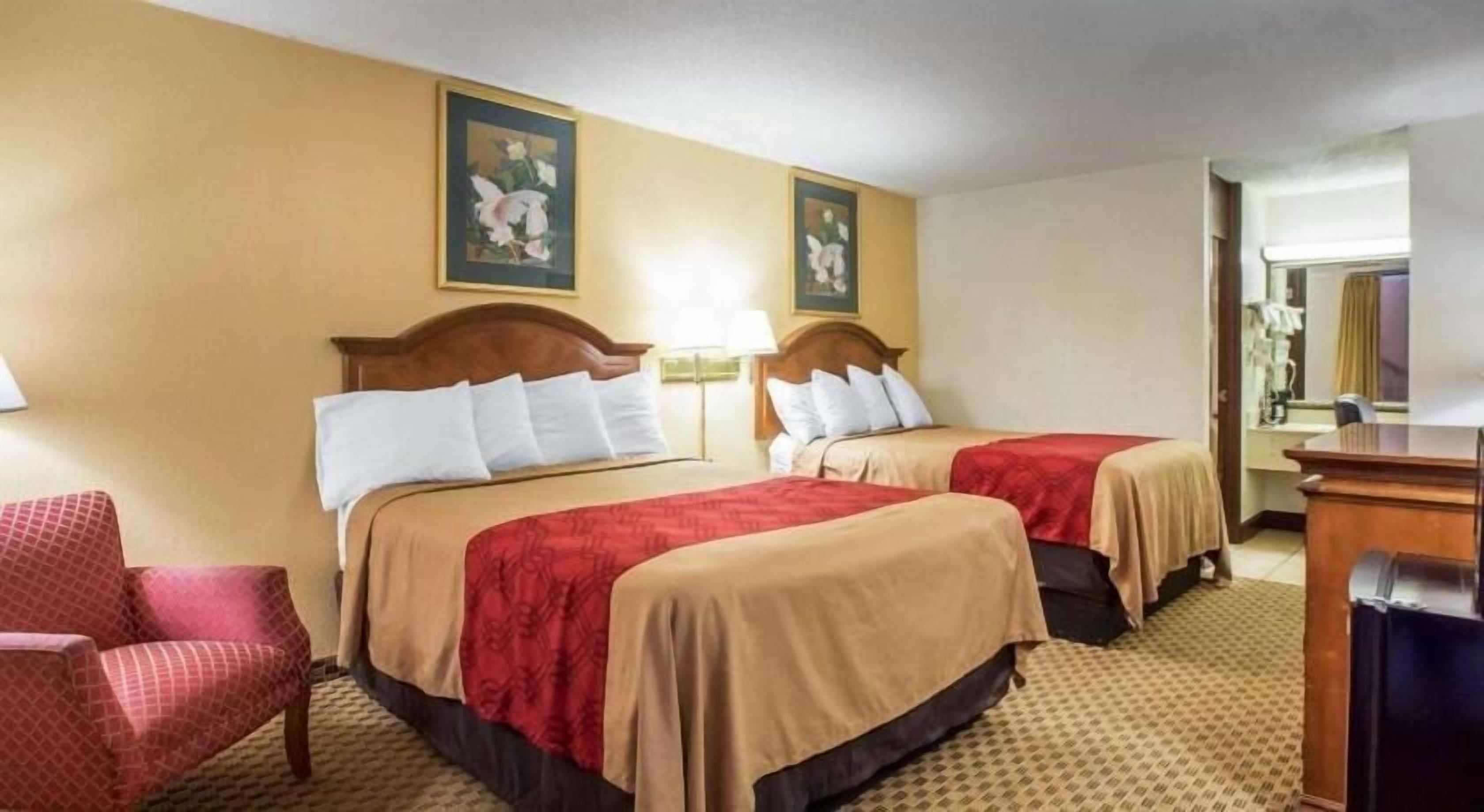 Desk, blackout curtains, iron/ironing board, rollaway beds