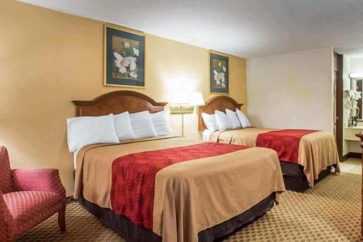 Desk, blackout curtains, iron/ironing board, rollaway beds