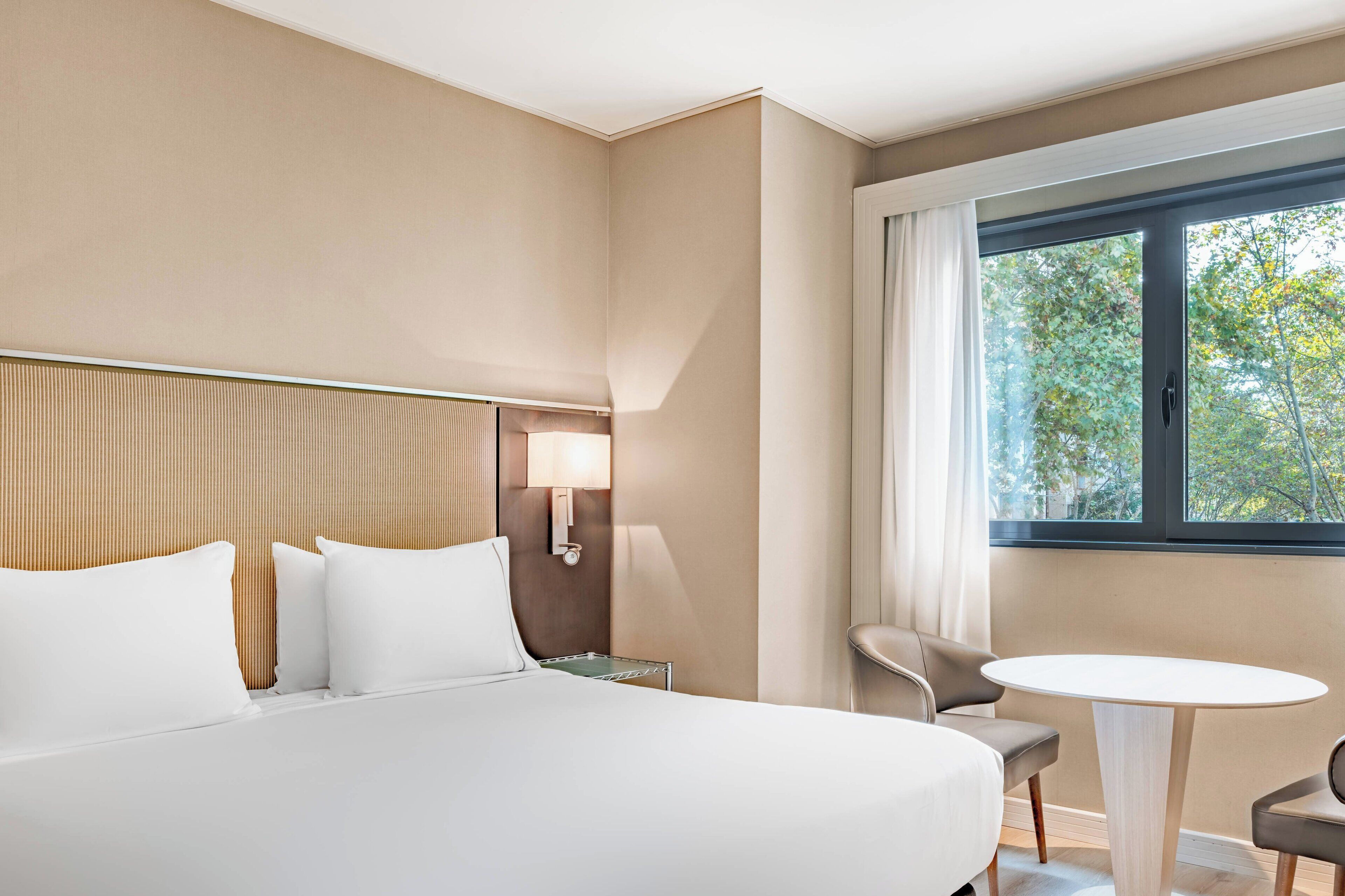 superior room, 1 king bed, non smoking | minibar, in-room safe, desk, blackout curtains