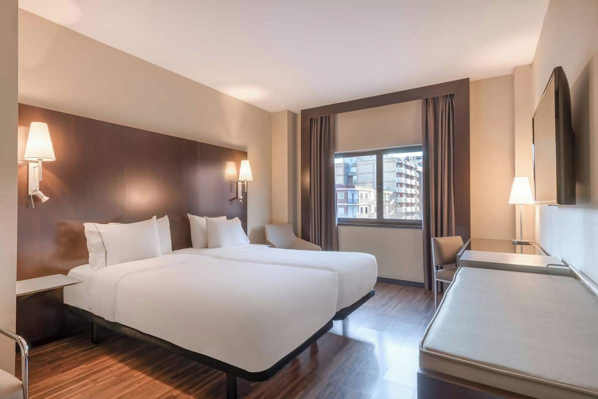 hypo-allergenic bedding, down duvets, minibar, in-room safe