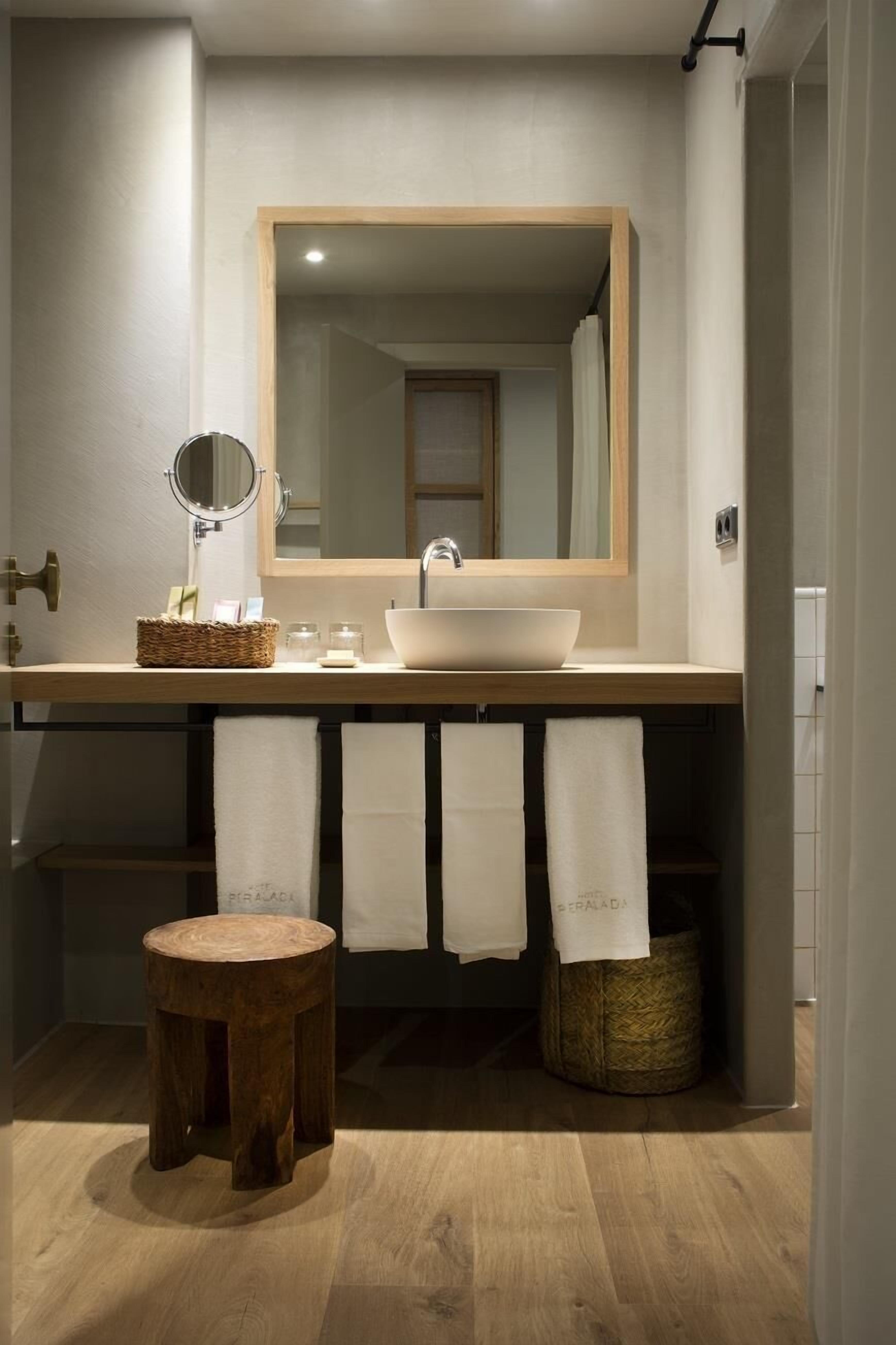 hair dryer, bathrobes, slippers, towels