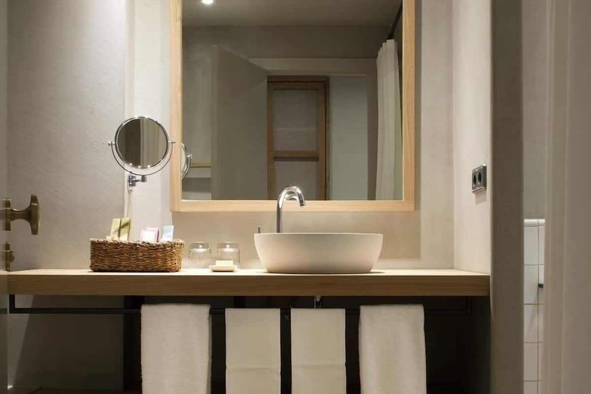 hair dryer, bathrobes, slippers, towels