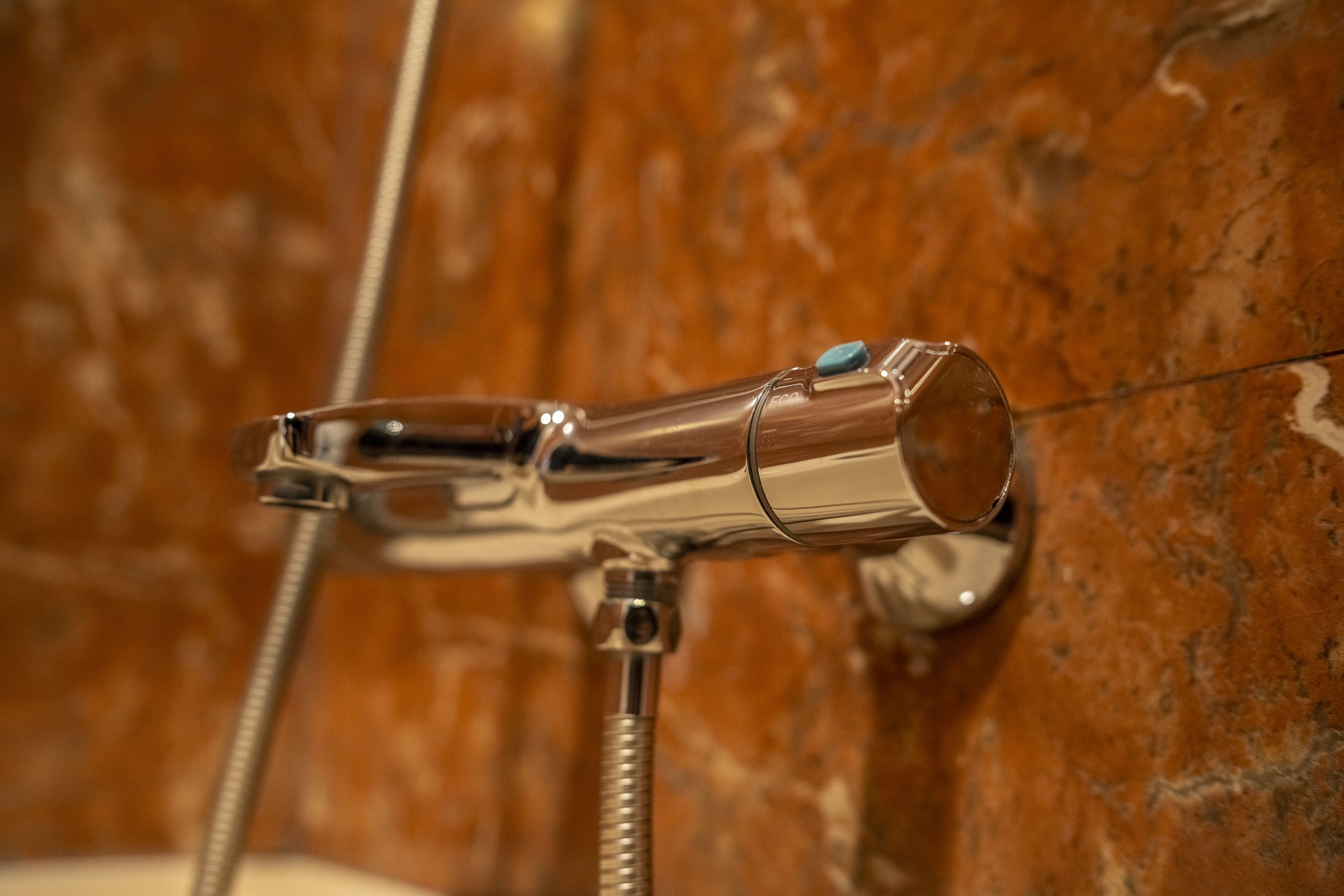 bathtub, hair dryer, bidet, towels