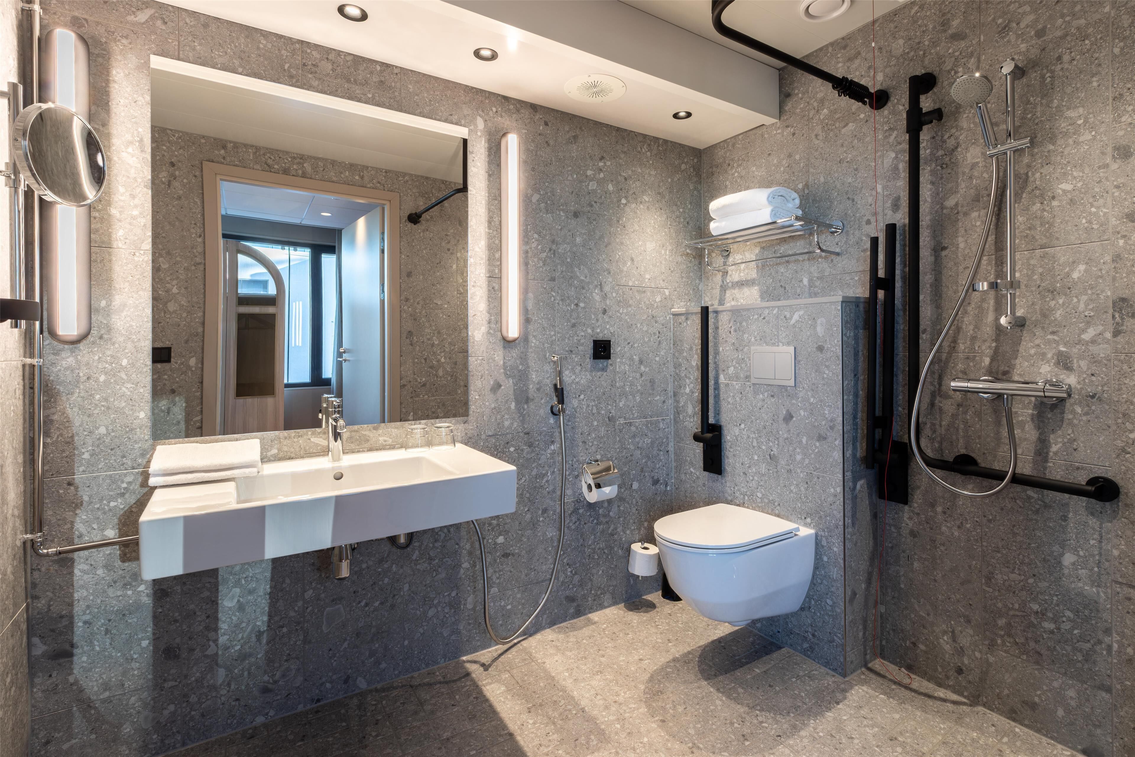 superior twin room | bathroom | hair dryer, towels, soap, shampoo