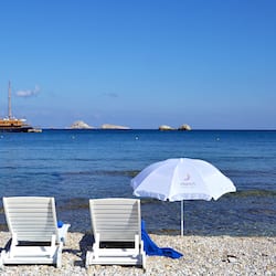 Beach nearby, beach umbrellas, beach towels