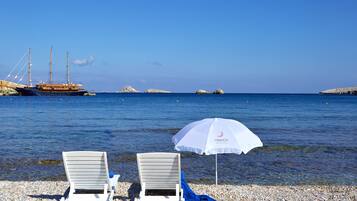 Beach nearby, beach umbrellas, beach towels