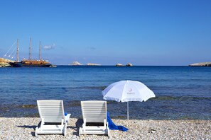 Beach nearby, beach umbrellas, beach towels