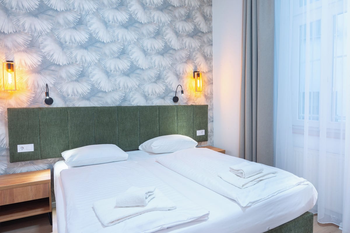 Standard Double or Twin Room, Courtyard View | In-room safe, desk, free WiFi, bed sheets