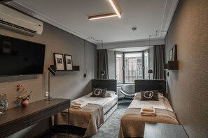 Twin Room | Hypo-allergenic bedding, minibar, desk, laptop workspace