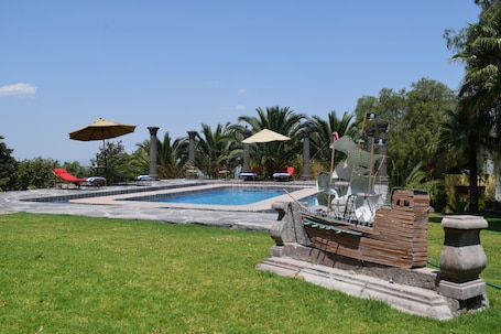 Outdoor pool, sun loungers