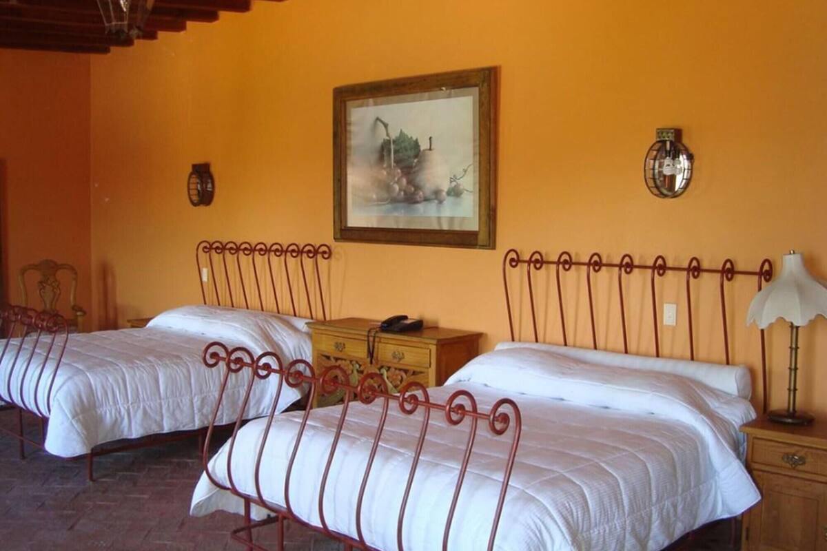 1 bedroom, desk, bed sheets