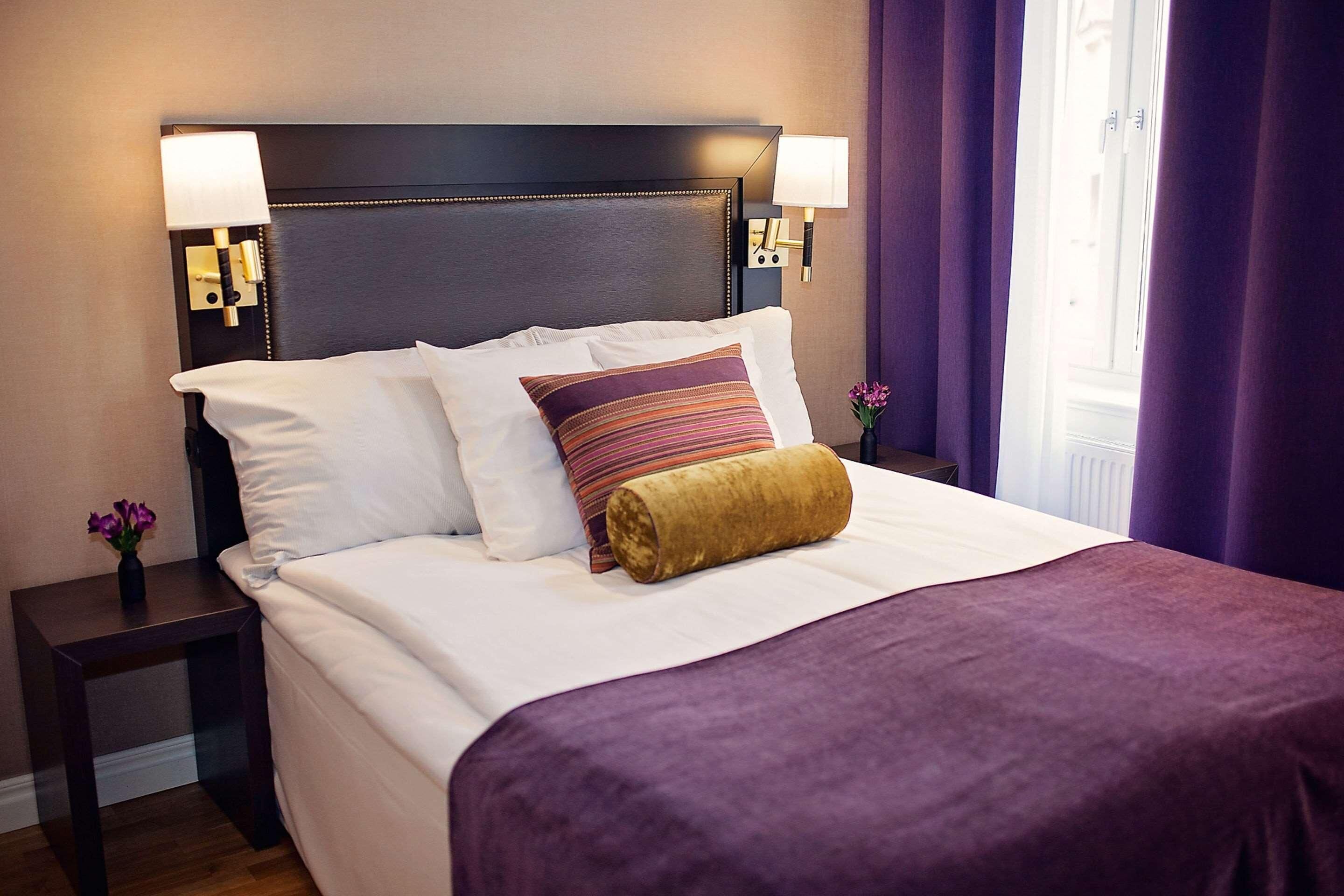 Premium bedding, desk, laptop workspace, iron/ironing board