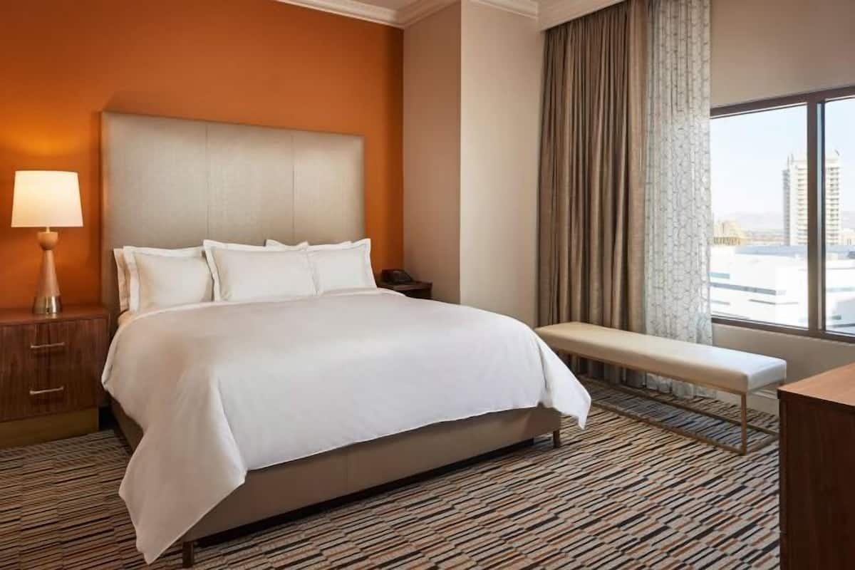 Premium bedding, down duvets, pillow-top beds, in-room safe
