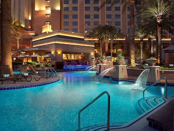 Outdoor pool, open 8:00 AM to 8:00 PM, cabanas (surcharge), sun loungers at Hilton Grand Vacations Club on the Las Vegas Strip