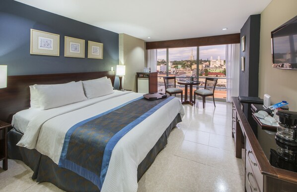 Pillow-top beds, minibar, in-room safe, desk