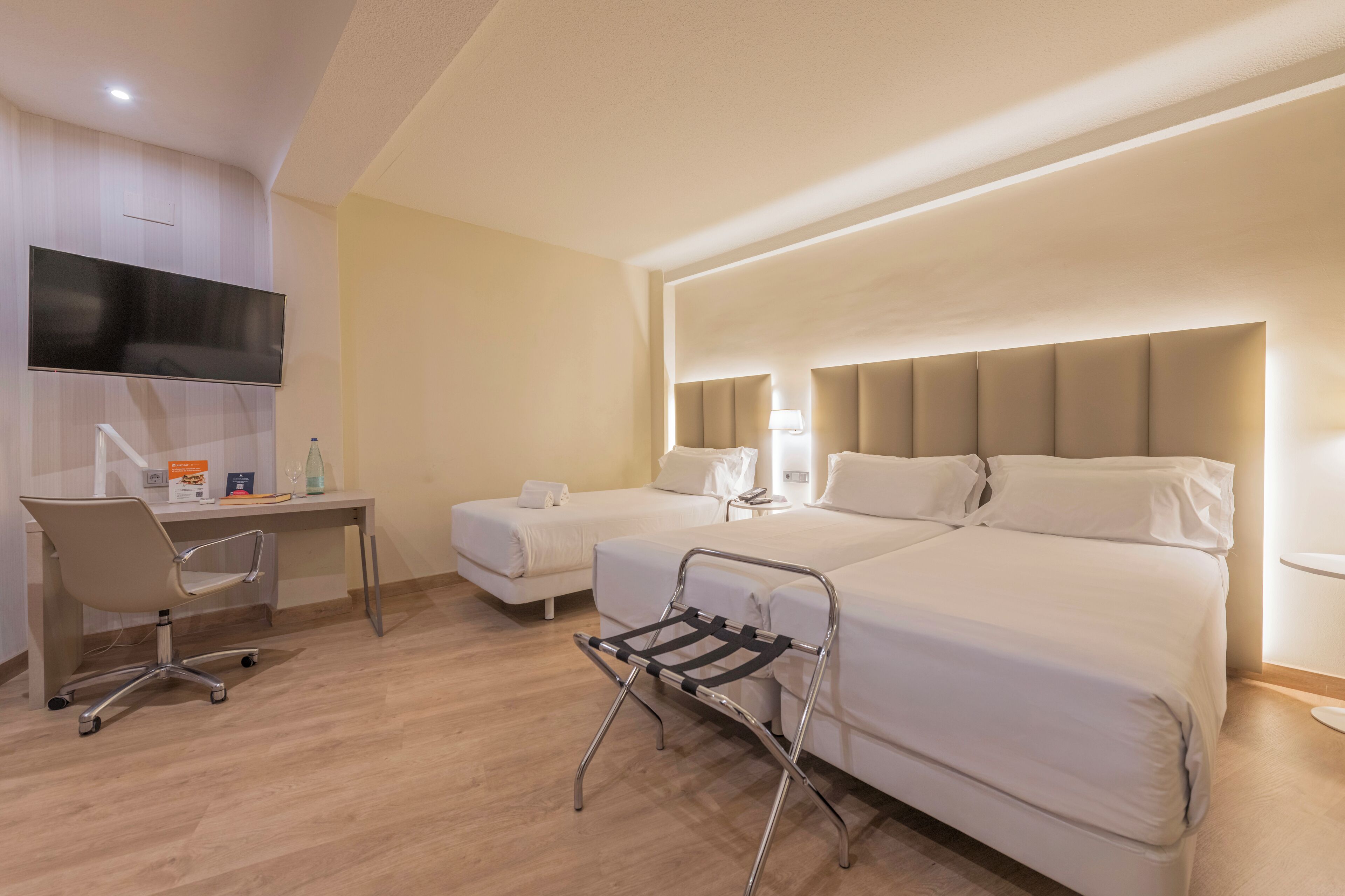 standard triple room | minibar, in-room safe, desk, blackout curtains