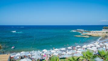 Beach nearby, sun loungers, beach umbrellas