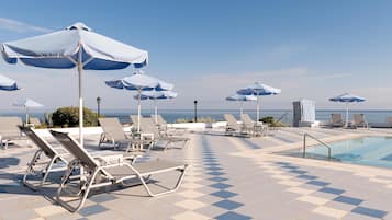 Indoor pool, seasonal outdoor pool, pool umbrellas, pool loungers