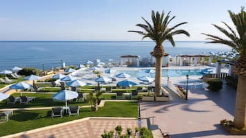 Indoor pool, seasonal outdoor pool, pool umbrellas, sun loungers