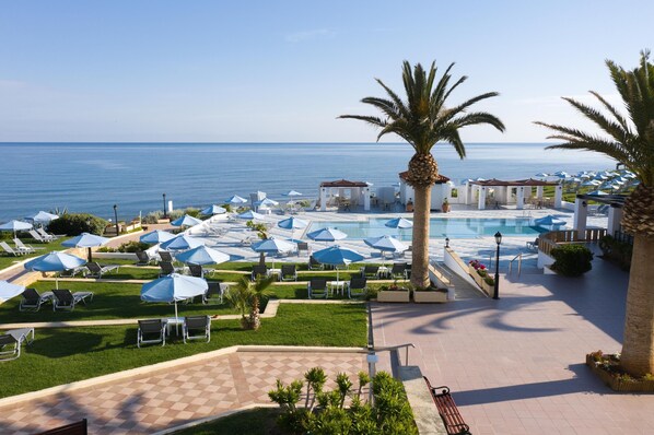 Indoor pool, seasonal outdoor pool, pool umbrellas, pool loungers