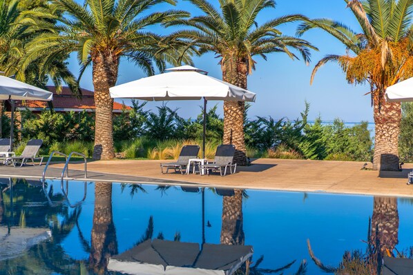 Outdoor pool, pool umbrellas, pool loungers