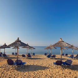 Private beach, beach umbrellas, beach towels, beach volleyball