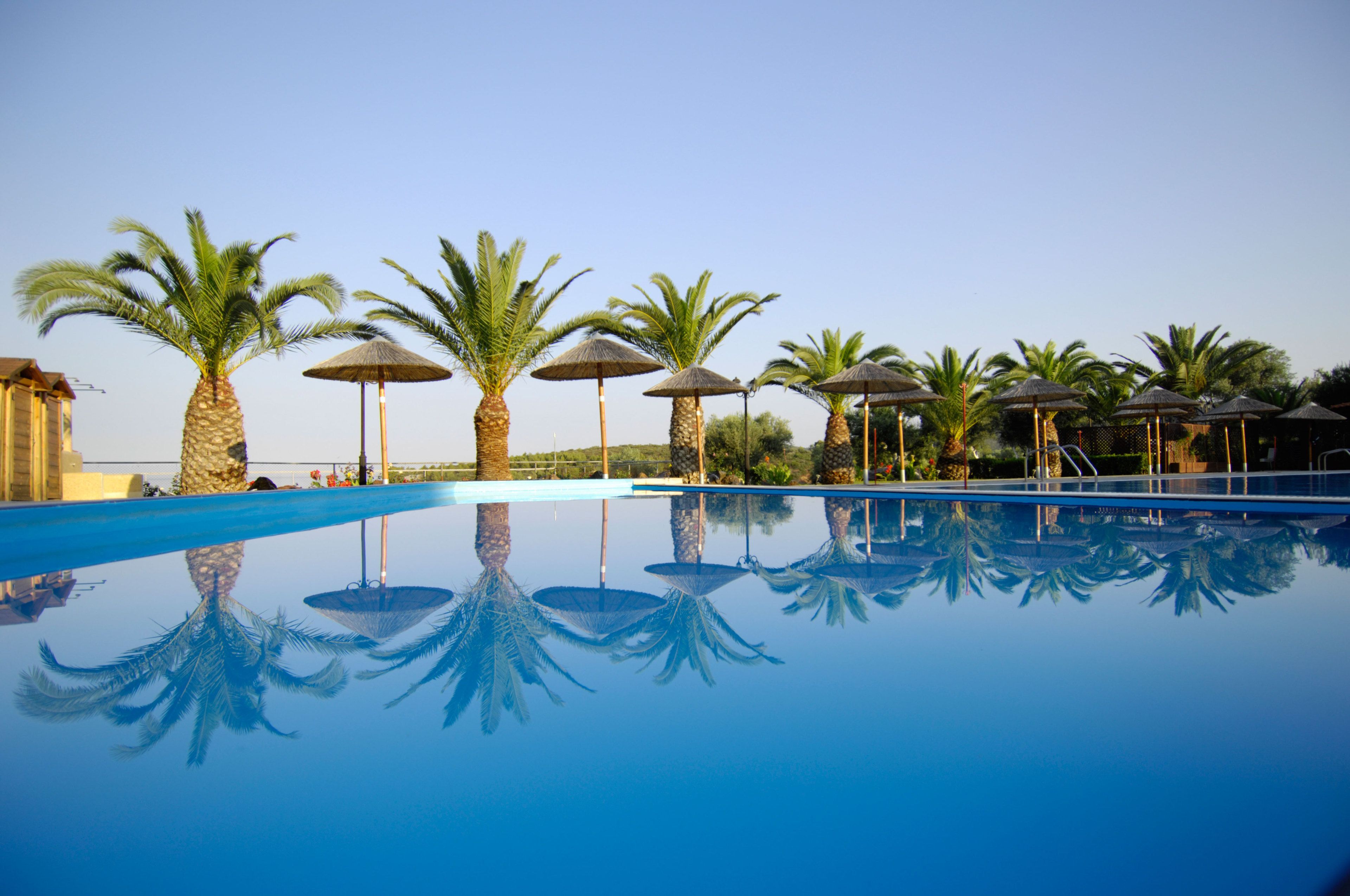 outdoor pool, pool umbrellas, pool loungers