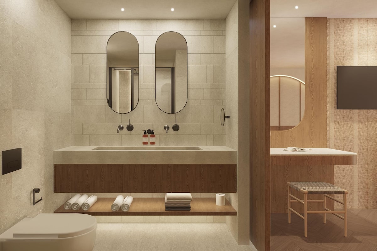family duplex suite | bathroom | combined shower/bathtub, designer toiletries, hair dryer, bathrobes