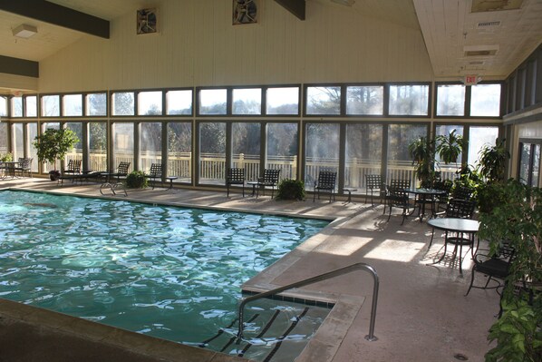 Indoor pool, open 8:00 AM to 8:00 PM, pool loungers