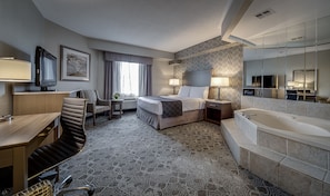 Queen Suite with Jetted Tub | Down duvets, in-room safe, desk, blackout curtains