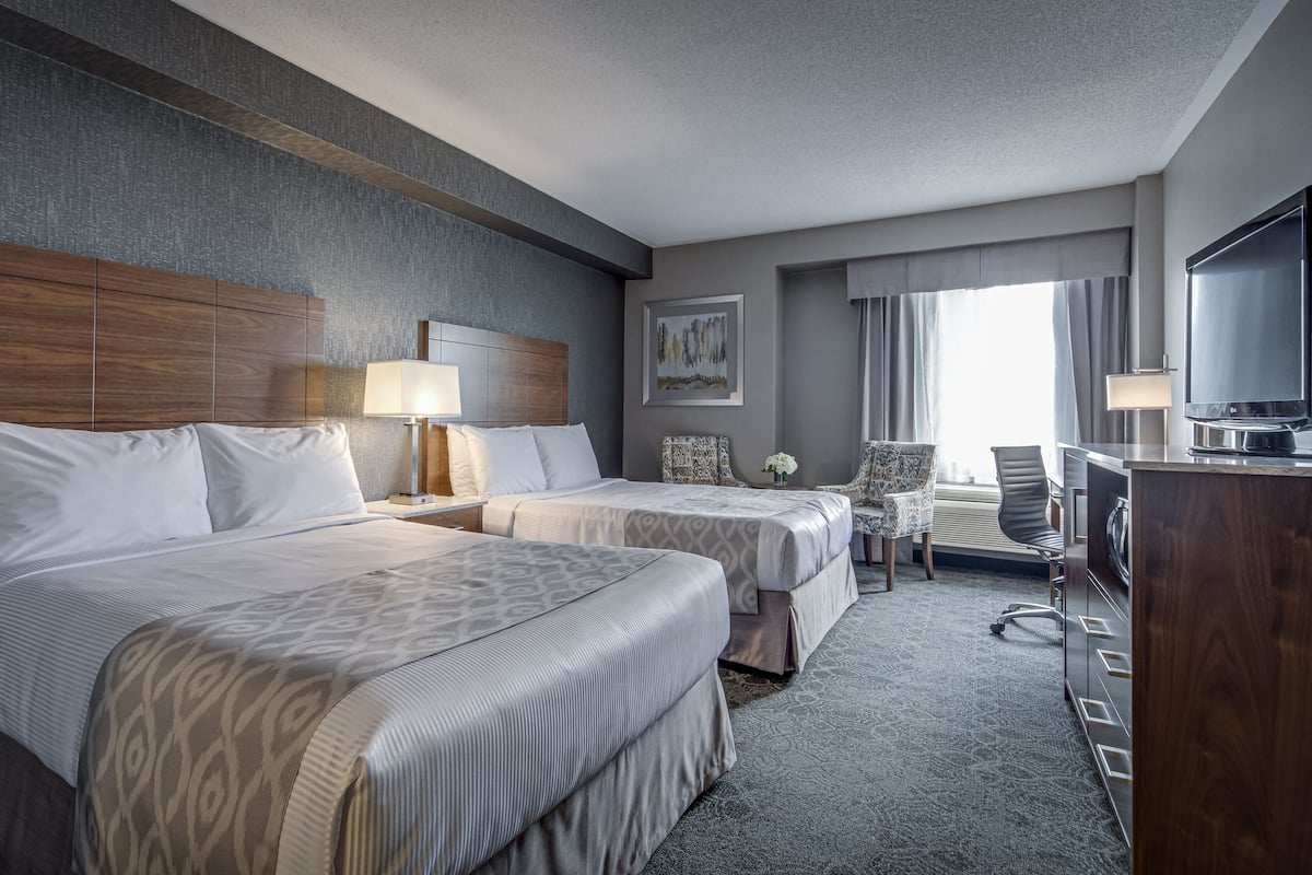 Standard Room with 2 queen beds | Down comforters, in-room safe, desk, blackout drapes