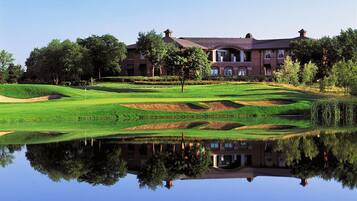 Experience a serene golf course setting with a tranquil atmosphere and well-maintained greens.