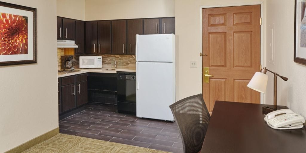 studio suite, 1 queen bed, kitchen | private kitchenette | fridge, microwave, coffee/tea maker