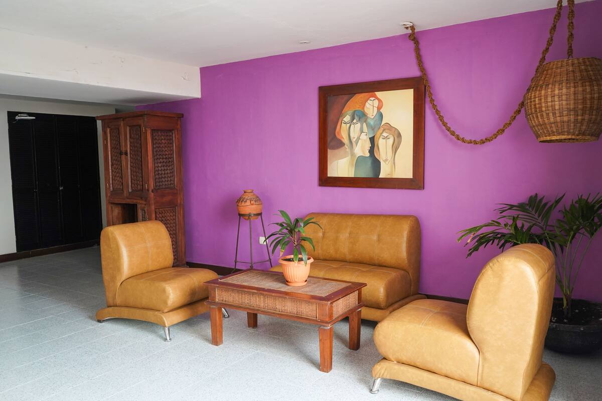 standard room, 2 double beds | living area | flat-screen tv