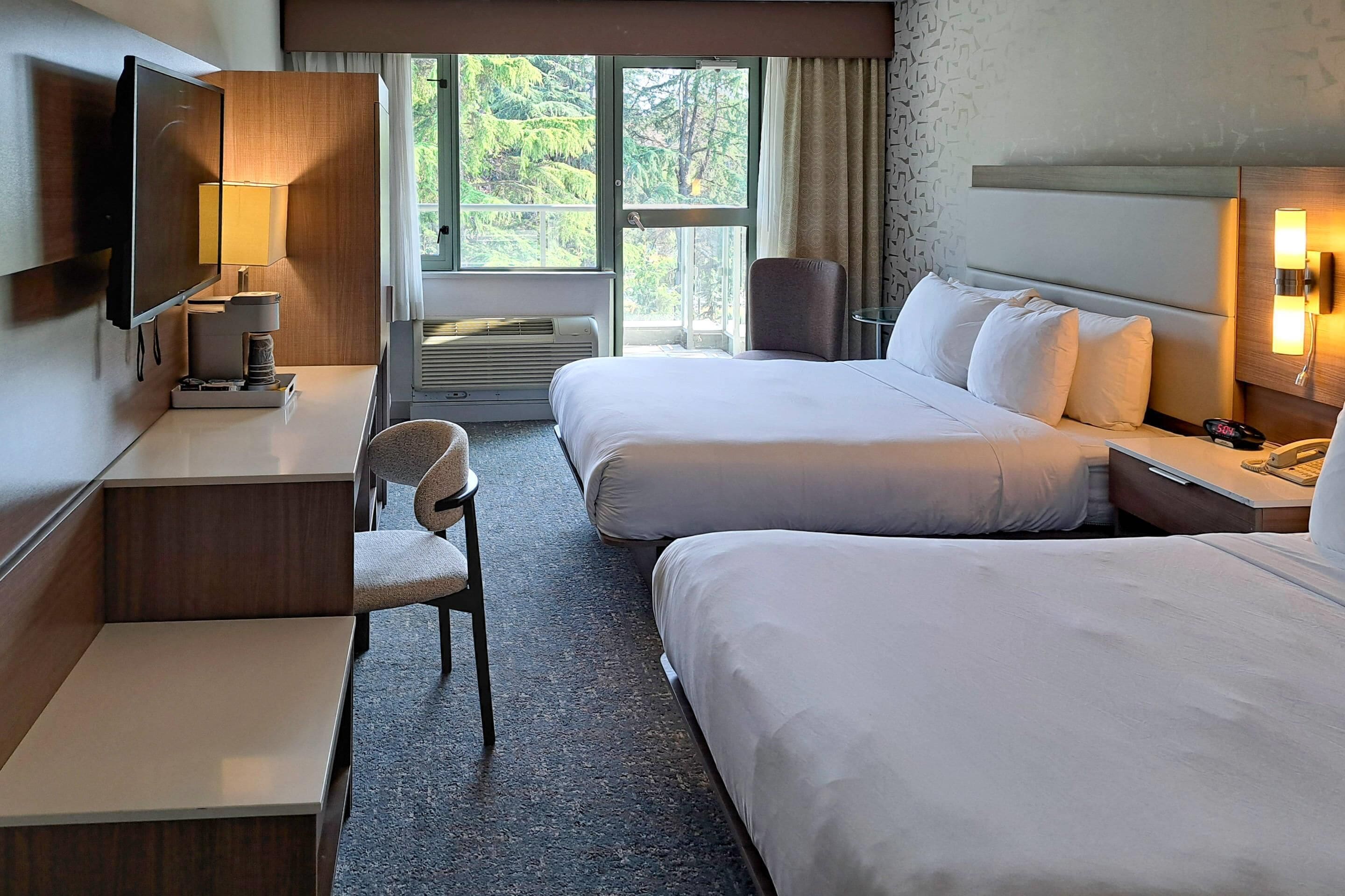 Room, 2 Queen Beds, Non Smoking, Balcony | In-room safe, desk, iron/ironing board, free cribs/infant beds