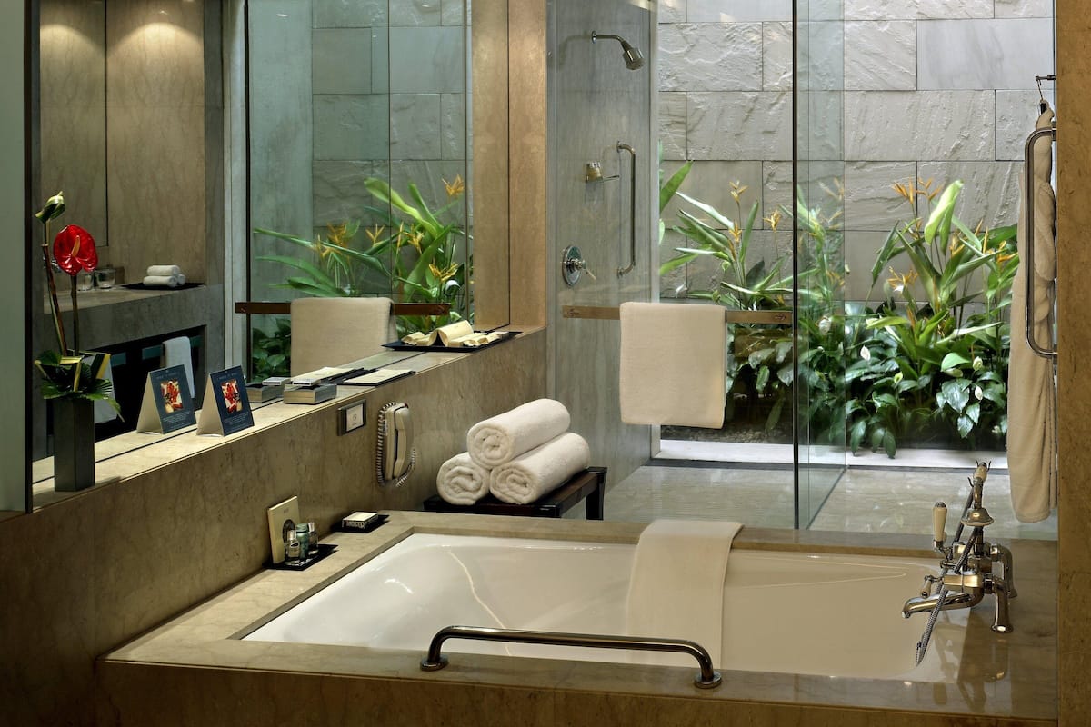 room, 1 king bed, garden view | bathroom | shower, deep-soaking bathtub, free toiletries, hair dryer